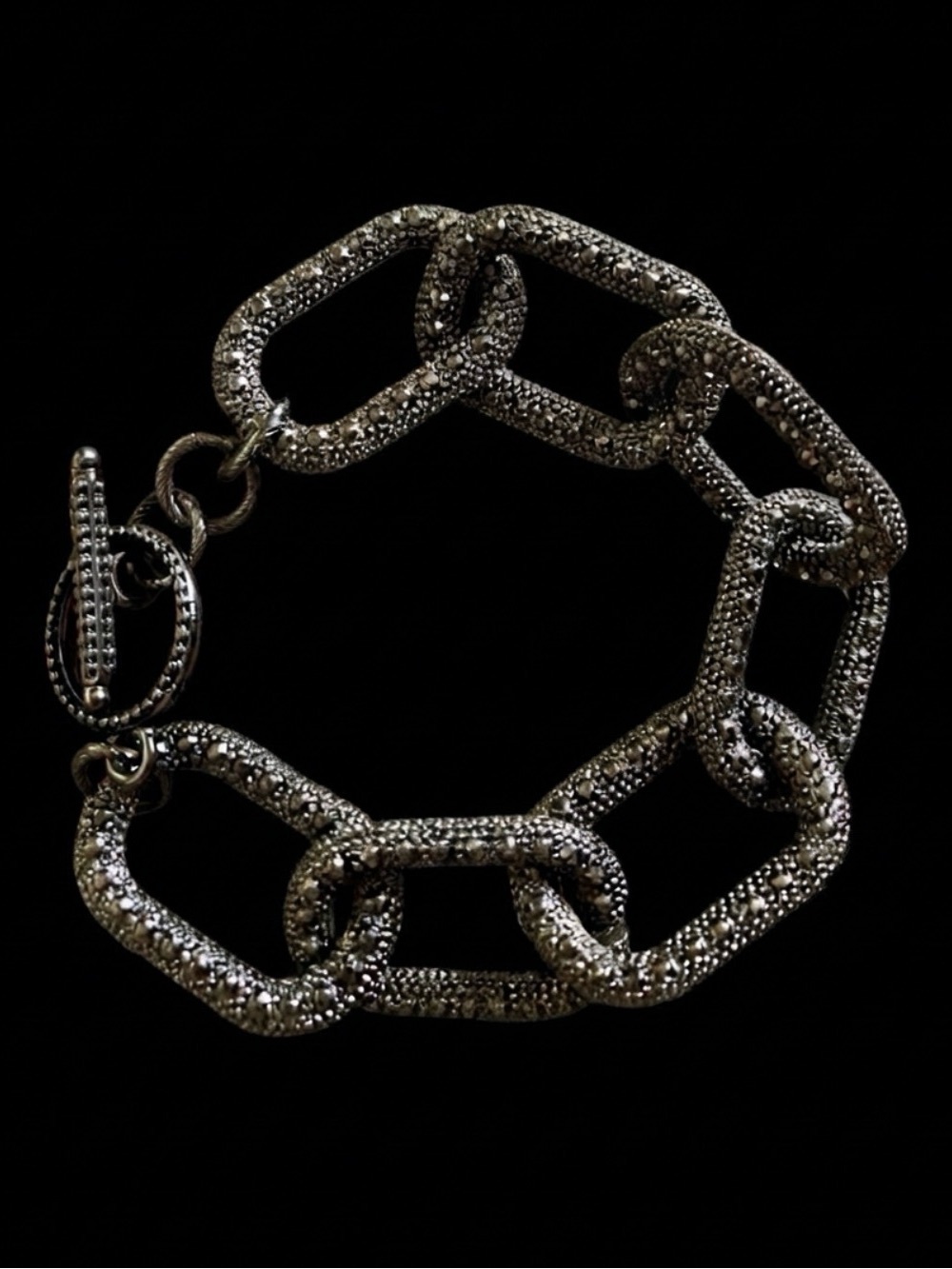 Chunky metal chain link bracelet with pave-set rhinestones and toggle clasp 8”